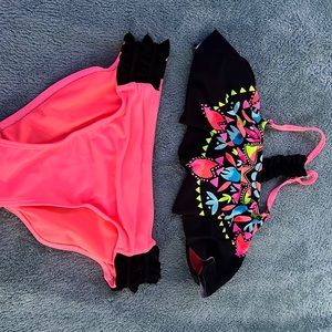 2 piece with a pattern design on the top